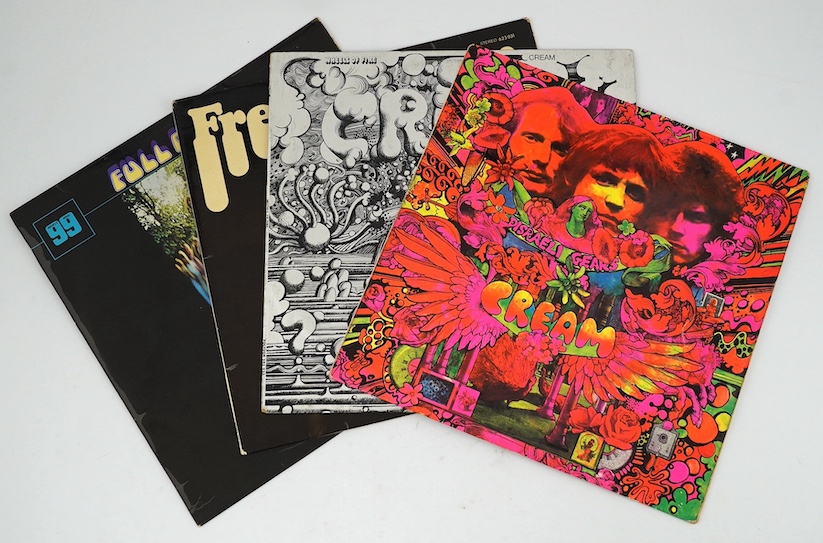 Four Cream related LP record albums; Disraeli Gears stereo on Reaction 594003, with fully laminated cover, Wheels of Fire, Fresh Cream, Full Cream. Condition - fair, minor wear to the covers and scratches to vinyl